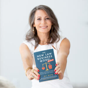 Ali Katz holds up a copy of her new book, The New Law Business Model–Revealed.